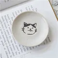 Japanese style ceramic cat sauce dish with cream finish and vertical relief texture - Sesame Glaze White