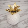 Modern minimalist white ceramic pineapple coin bank with elegant gold metal leaves - White