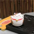 Japanese lucky cat ceramic tumbler figurine with traditional tricolor design and bell - Fortune Cat