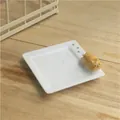 Square ceramic sauce dish with 3D orange cat figurine and embossed feline face - Orange Cat