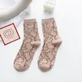 Cute brown mid-calf socks featuring all-over cartoon cat faces in soft cotton - Light Coffee