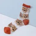 Cute sheer mesh socks featuring orange cat embroidery and vibrant orange trim details - Caramel Red