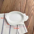 Miniature white pig-shaped ceramic plate with matte embossed texture for seasoning - Bright White / White