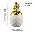 Petit pot de rangement ananas en céramique avec base blanche et couvercle doré - S / Or blanc