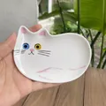 Piattino gatto in ceramica con occhi eterocromatici per gioielli o condimenti - Gatto Bianco Sdraiato