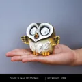 Solar powered owl resin light statue in earth yellow with LED eyes for outdoor garden - Style A
