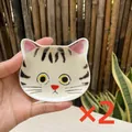 Set of 2 cute cat face shaped ceramic dipping saucers in white with black stripes - Yellow and Black Tabby Cat