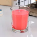 Pink scented candle in transparent glass jar with red decorative patterns for home decor - Red Candle