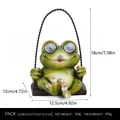 Solar frog hanging on a swing with LED eyes, garden resin statue dimensions 18x12.5cm - Swing Frog