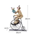 Vintage resin circus clown on bicycle figurine with spade pattern, 30cm height - Cycling Clown