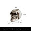 Skull shaped resin candle holder with realistic bone texture for Halloween decor - White