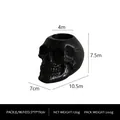 Black resin skull shaped organizer with circular opening measuring 10.5x7x7.5cm - Black