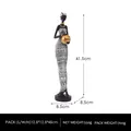 African woman figurine in black and white tribal dress with height measurement details - Head-wrapped African Woman / Black and White