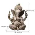 Heer Ganesha standbeeld in zandsteen afwerking, zittende pose, maat 21x16x13cm decor - Groot / Zandsteen Kleur