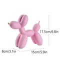 Escultura de perro globo de resina rosa con medidas 17,5 cm alto y 15 cm largo - Rosa (Nariz Dorada)