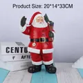 Statuina Babbo Natale in resina con sacco regali, orologio, misura 20x14x33cm, 1080g - Babbo Natale con regali (RRW101-A) / Rosso bianco