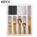 48-piece gold stainless steel cutlery set with black handles and white storage tray - Extended Collection (Gold)
