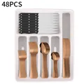 48-piece rose gold stainless steel cutlery set with black handles in a drawer organizer - Extended Collection (Rose Gold)