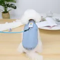Detail of light blue quilted pet vest with teddy bear label and metal D-ring attachment - S / Blue