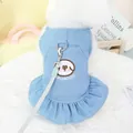 Light blue denim pet dress with cartoon embroidery and matching leash on small white dog - XS / Light Blue