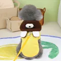 Detail of yellow pet hoodie with bear-shaped plush hood and metal D-ring for leash attachment - S / Yellow