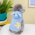 Close-up of blue plush pet hoodie featuring rabbit ears and a cute bear embroidery - S / Blue