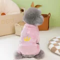 Close-up of pink fleece pet vest featuring a D-ring and crown embroidery detail - S / Pink