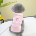 Detail of pink houndstooth dog vest featuring soft faux fur collar and metal D-ring buckle - S / Pink