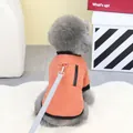 Detail of orange pet puffer jacket with metal D-ring and zipper pocket for small dogs - S / Orange Red