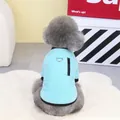 Close-up of light blue pet vest featuring a black zipper pocket and sturdy D-ring for leashes - S / Light Blue