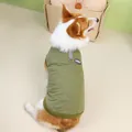Close-up of olive green quilted dog vest with metal D-ring for leash attachment - S / Olive Green