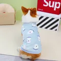 Close-up of soft light blue fleece pet vest with white cloud patterns on a corgi - S / Blue