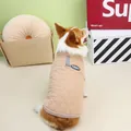 Quilted pet vest with metal D-ring for leash attachment shown on a Corgi dog - S / Khaki