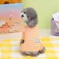 Detail van oranje gestreepte huisdierenpyjama met 'keep smile' patch op katoenen stof - S / Oranje