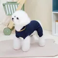 Detail of navy knit pet onesie with yellow trim on a white Bichon dog model - S / Navy Blue