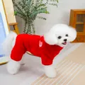 Close-up of red fleece pet jumpsuit with white embroidery detail on a bichon dog - S / Red