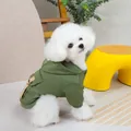 Detail of green pet hoodie featuring functional cargo pocket and ribbed cuffs on dog - S / Green