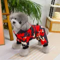 Detail of a camouflage pet jumpsuit for small dogs featuring back drawstring and ribbed cuffs - S / Red