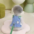 Detail of blue striped pet harness dress with green straps and cute cartoon patch - S / Blue