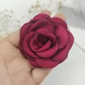 Deep red handmade fabric camellia flower accessory with burnt edges and satin texture - Burgundy
