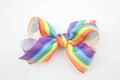 Detailed view of rainbow grosgrain ribbon bow with high-quality fabric texture - Rainbow