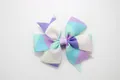 Detailed view of the layered rainbow gradient grosgrain ribbon bow with geometric print - Geometric Light Purple