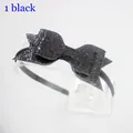 Sparkly black glitter multilayer bow headband for kids on transparent display stand - Black
