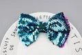 Peacock blue sequin bow accessory with gradient purple accents for DIY fashion - Blue