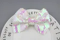 Iridescent white sequin bow accessory with pink and green pearlescent finish - White
