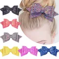 Barrettes à cheveux nœud pailleté en six couleurs avec étoiles portées par un modèle - Barrette / Set of 6 Colors (Image 1)