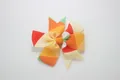 Handmade rainbow wave print grosgrain ribbon bow hair clip with orange center - Triangle Yellow