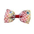Detailed close-up of rainbow scale pattern and floral ribbon bow with red center - Rainbow Scale Floral Pattern (4)