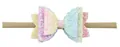 Detail van glitter gelaagde strik hoofdband met verloopkleuren en elastische nylon band - Regenboog
