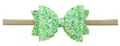 Detail van groene glitter strik hoofdband met golvende randen en gekleurde lovertjes - Nr. 7 Groen